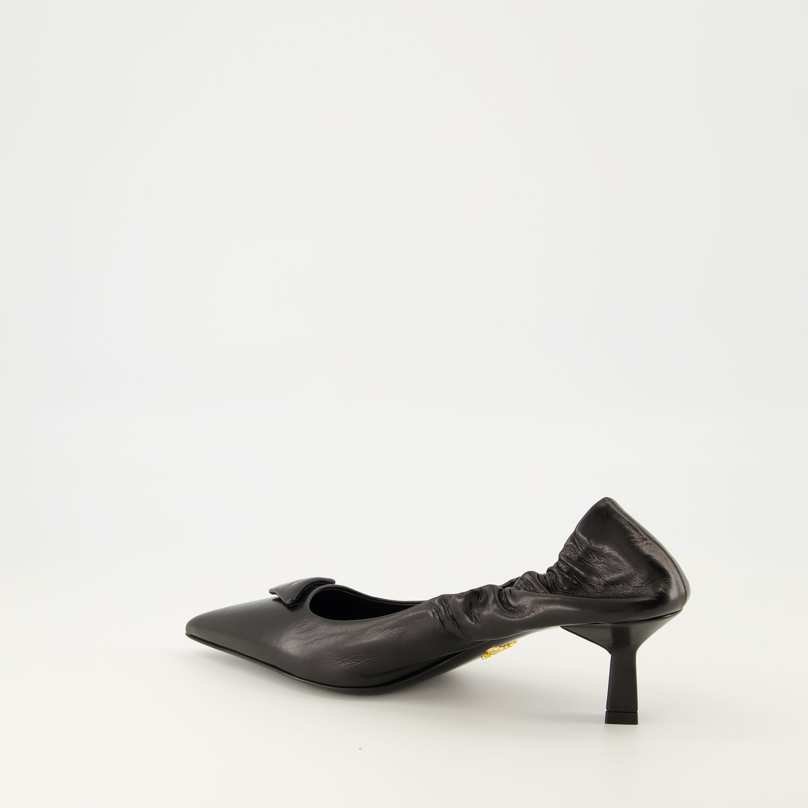 Worn Leather Pumps