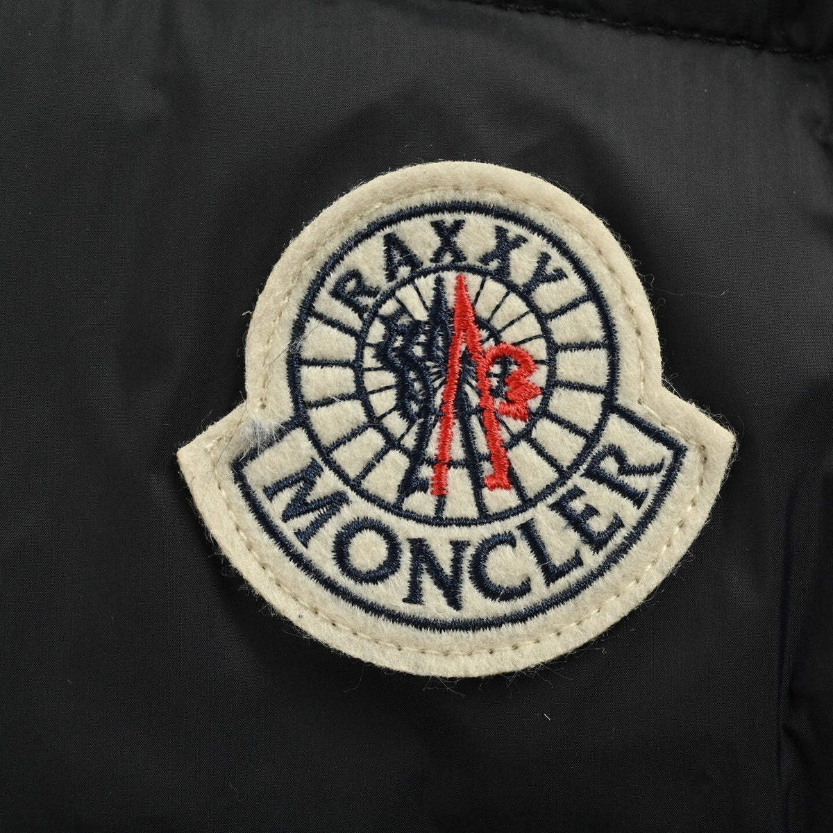 Raxxy 3D Sculptural Puffer | Black