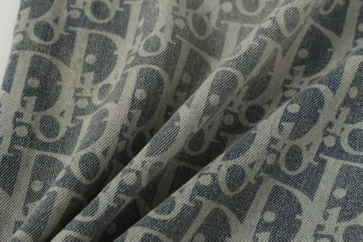 Oblique All-Over Print Faded Denim Jeans | Blue